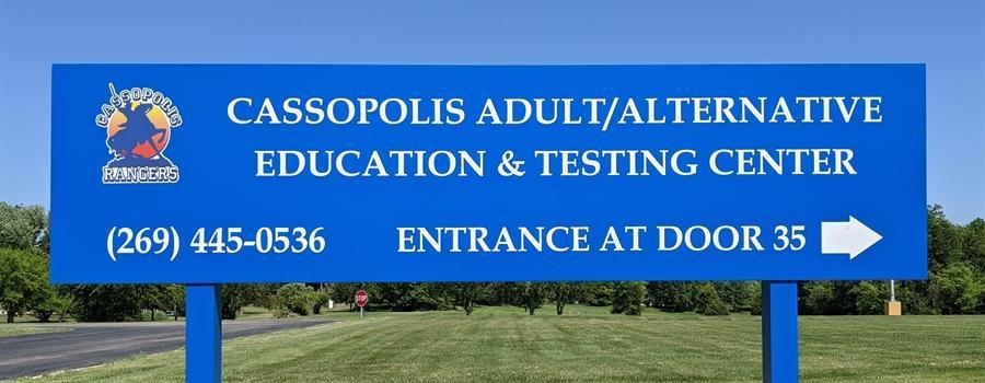 Cassopolis Adult/Alternative Education & Testing Center sign with phone number and arrow to Door 35