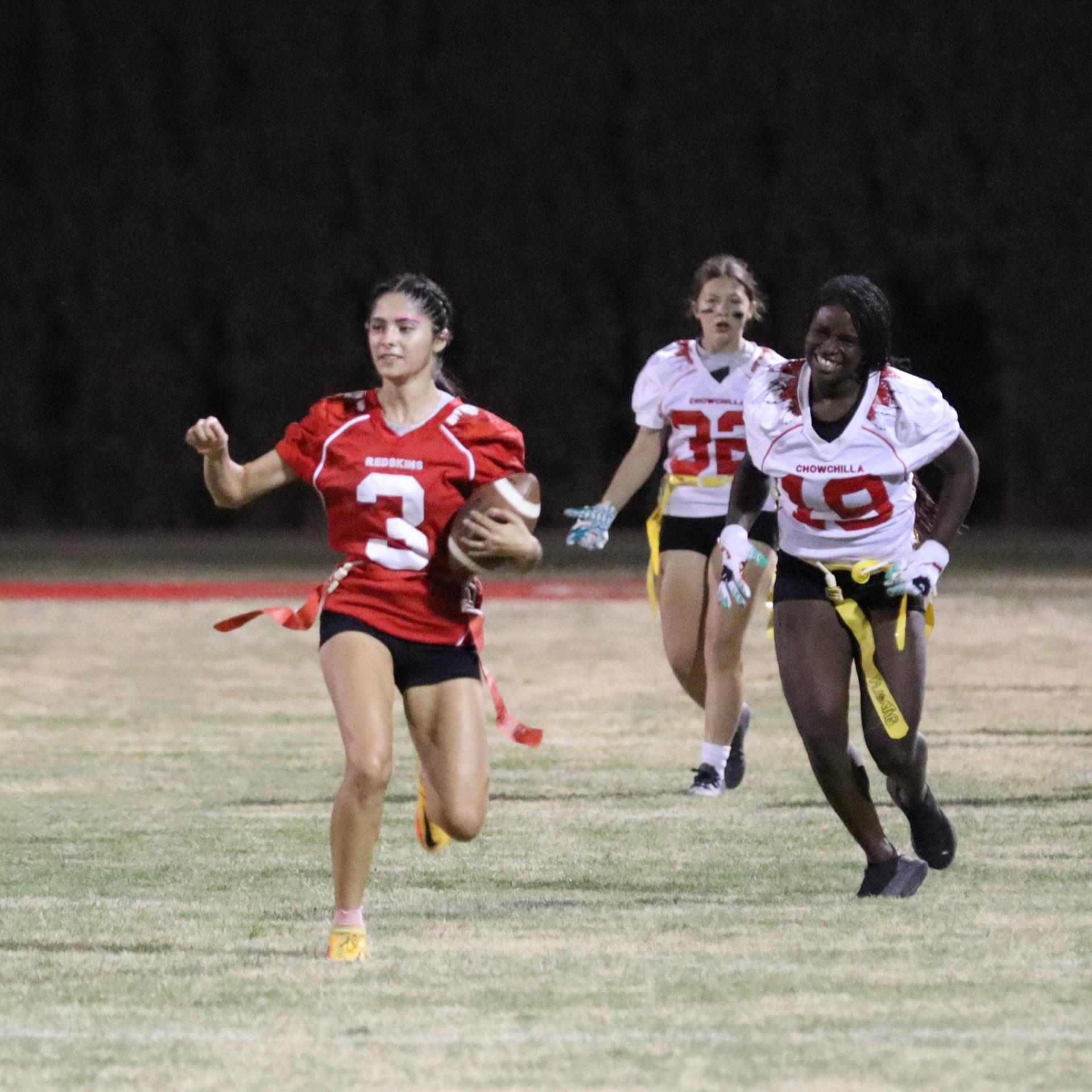 girls playing flag football