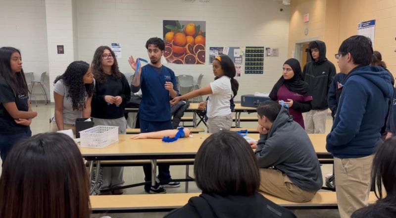 HOSA Officers interacting with students