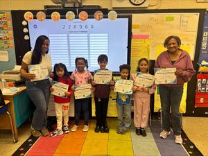 Staff members with students