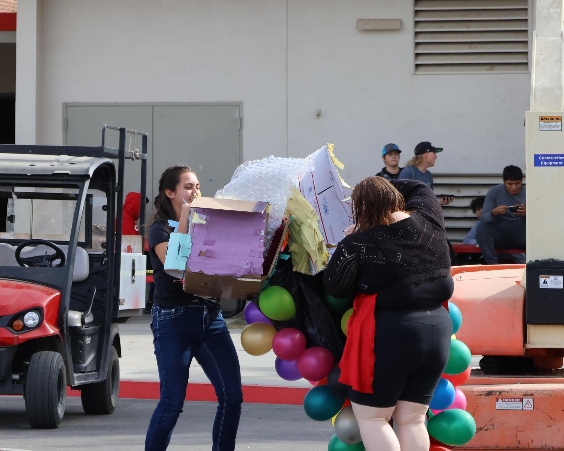 students and staff enjoying the pumpkin drop