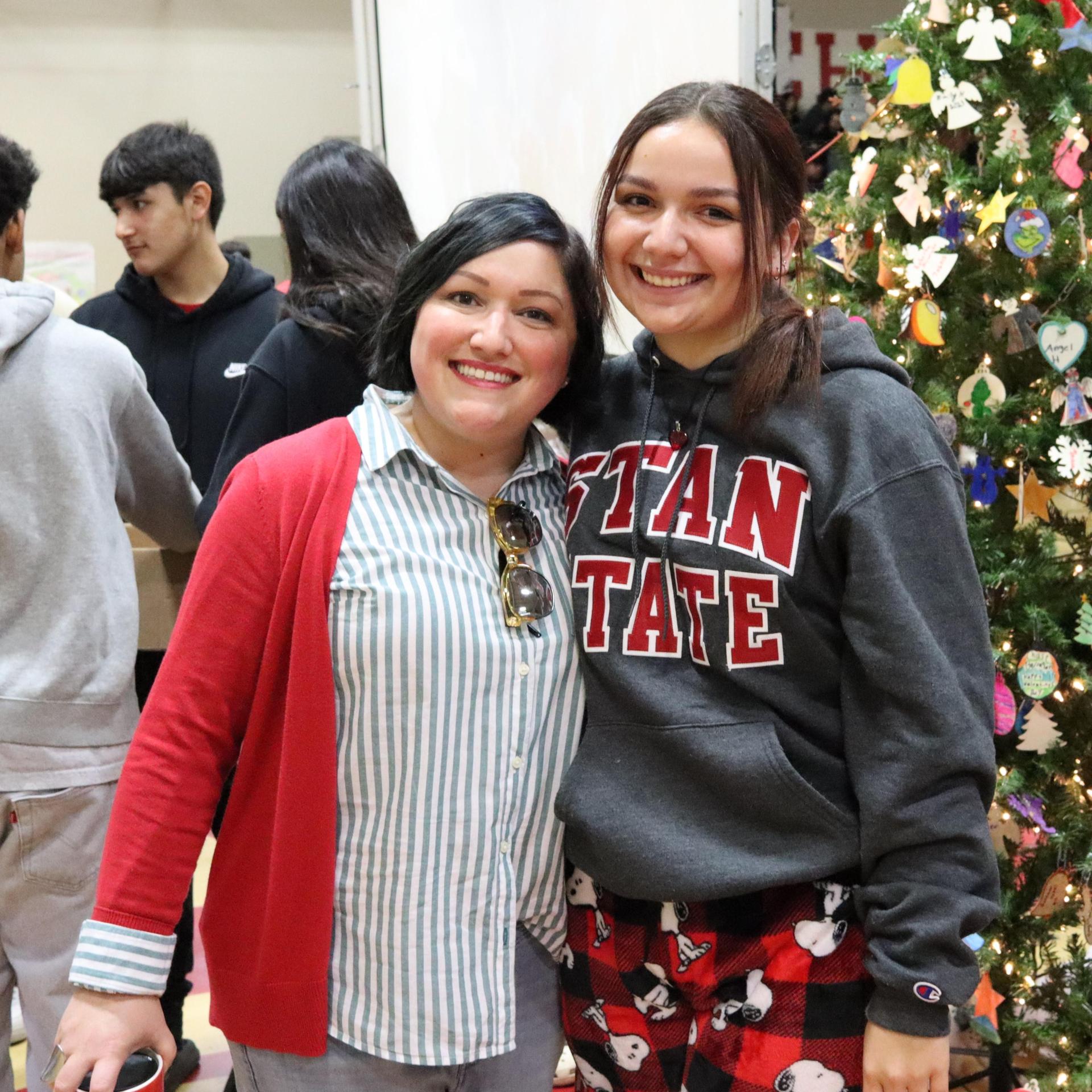 students and staff posing at the winter wishes rally