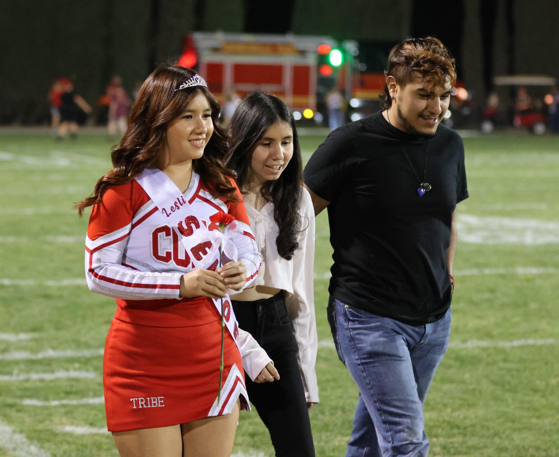 seniors and their escorts celebrating senior night