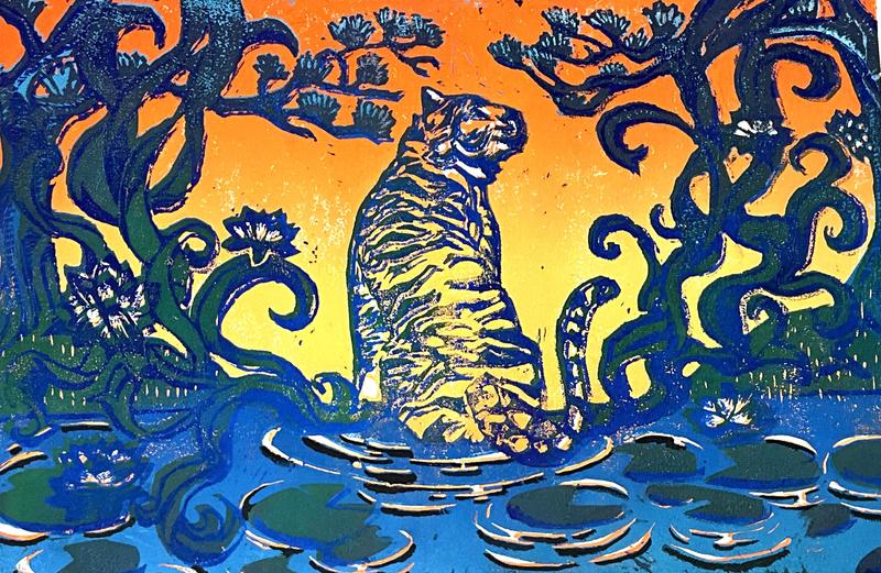 A vibrant, stylized artwork titled “Tiger Lily” showing a tiger sitting in a pond surrounded by large lily pads and swirling, decorative trees. The background features a warm gradient sky in shades of orange and yellow, contrasting with bold blue and green tones in the water and foliage. The piece has a textured, print-like appearance with expressive lines and patterns.