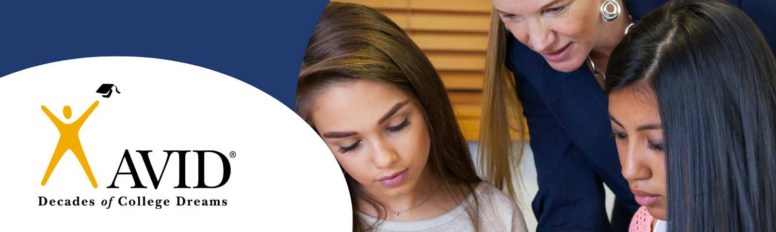 AVID Program banner showing stock photo of teacher teaching two students