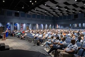 Woodland Hills faculty and staff gather in the auditorium