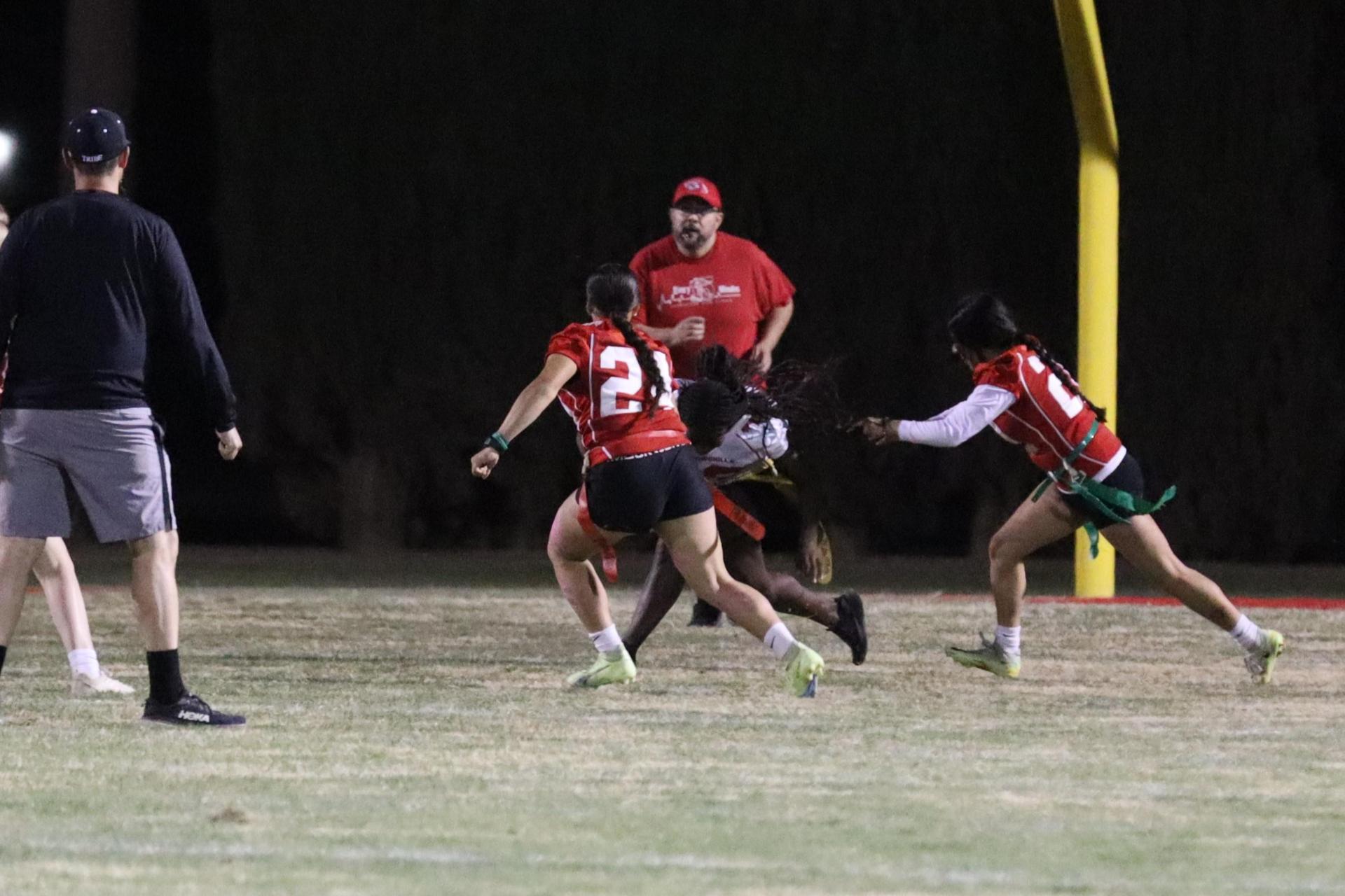 girls playing flag football
