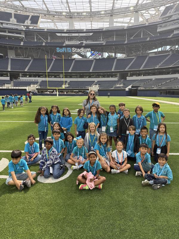 kids with their teacher at sofi stadium