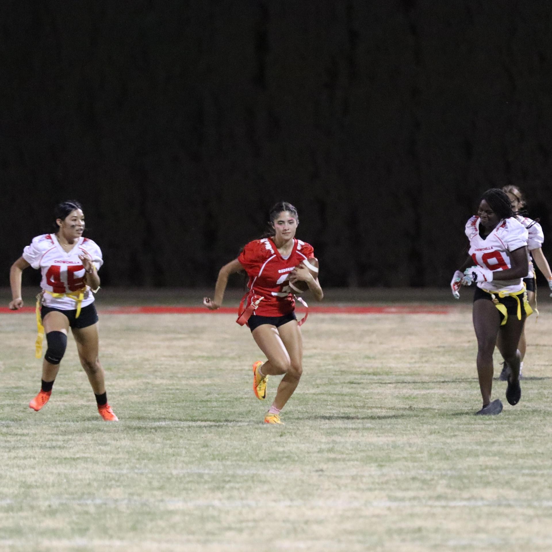girls playing flag football