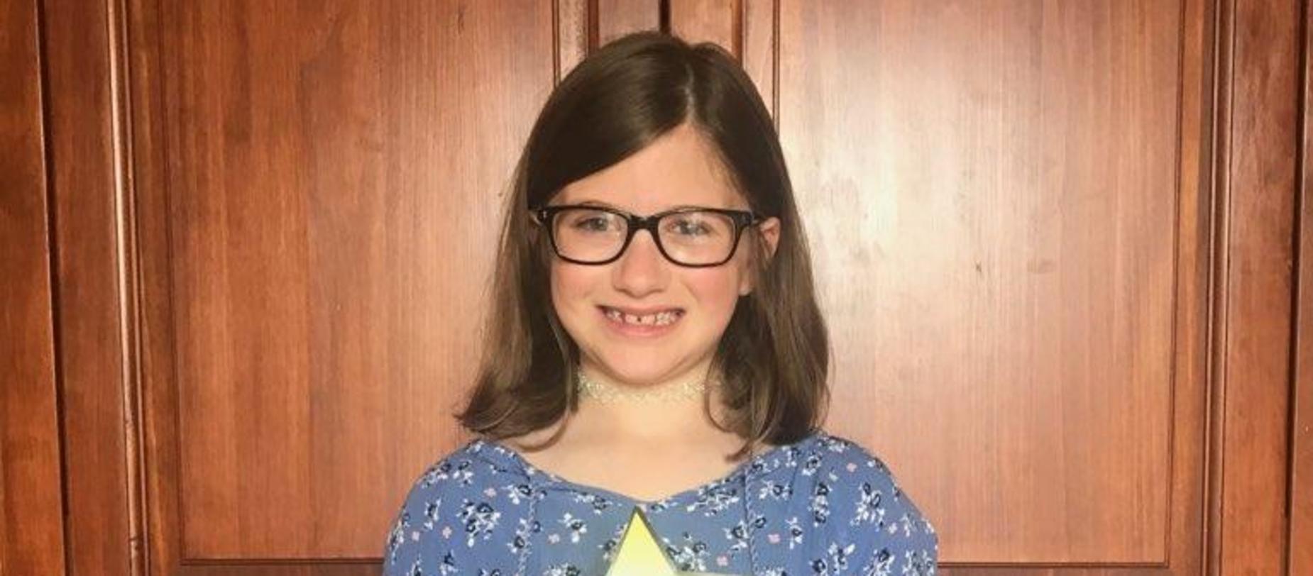 girl smiling for the camera