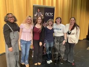 TJCA Students holding one of the awards.