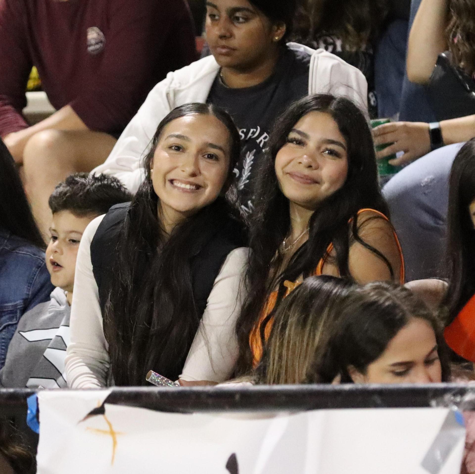 students, staff, and community members enjoying Friday night at the football game