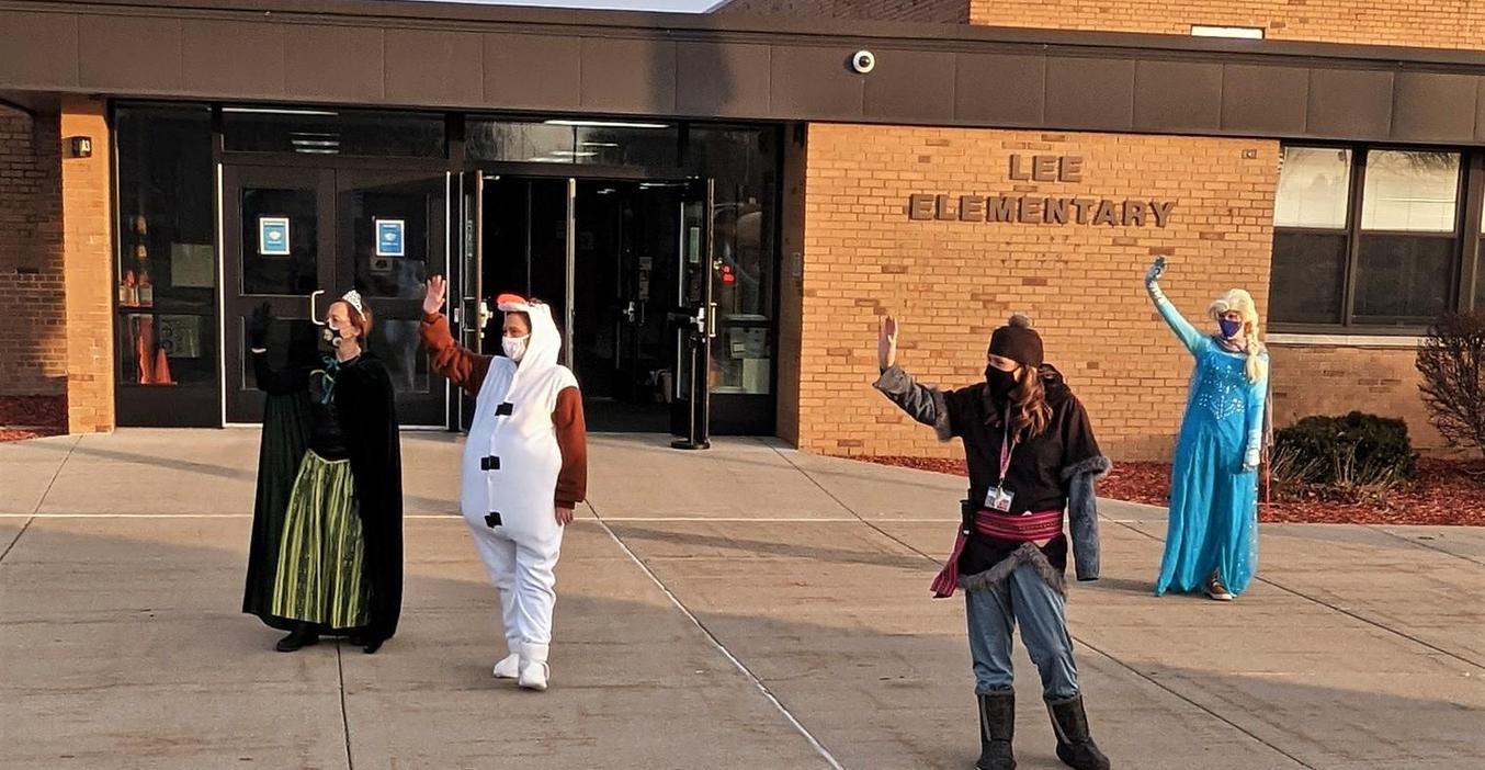 Lee staff dress up as the cast from Frozen to greet students to school.