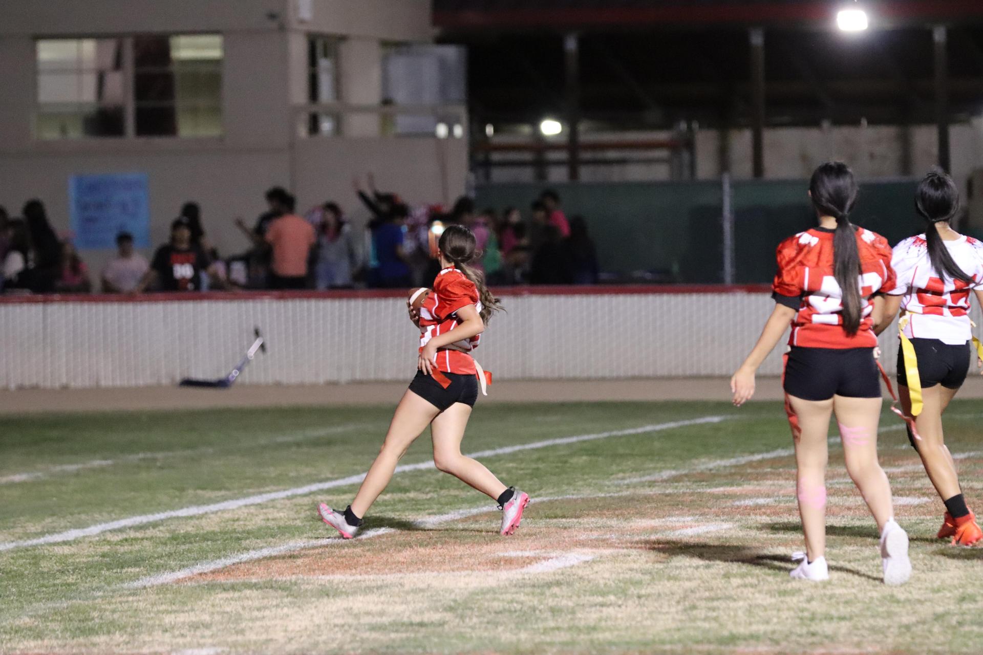girls playing flag football