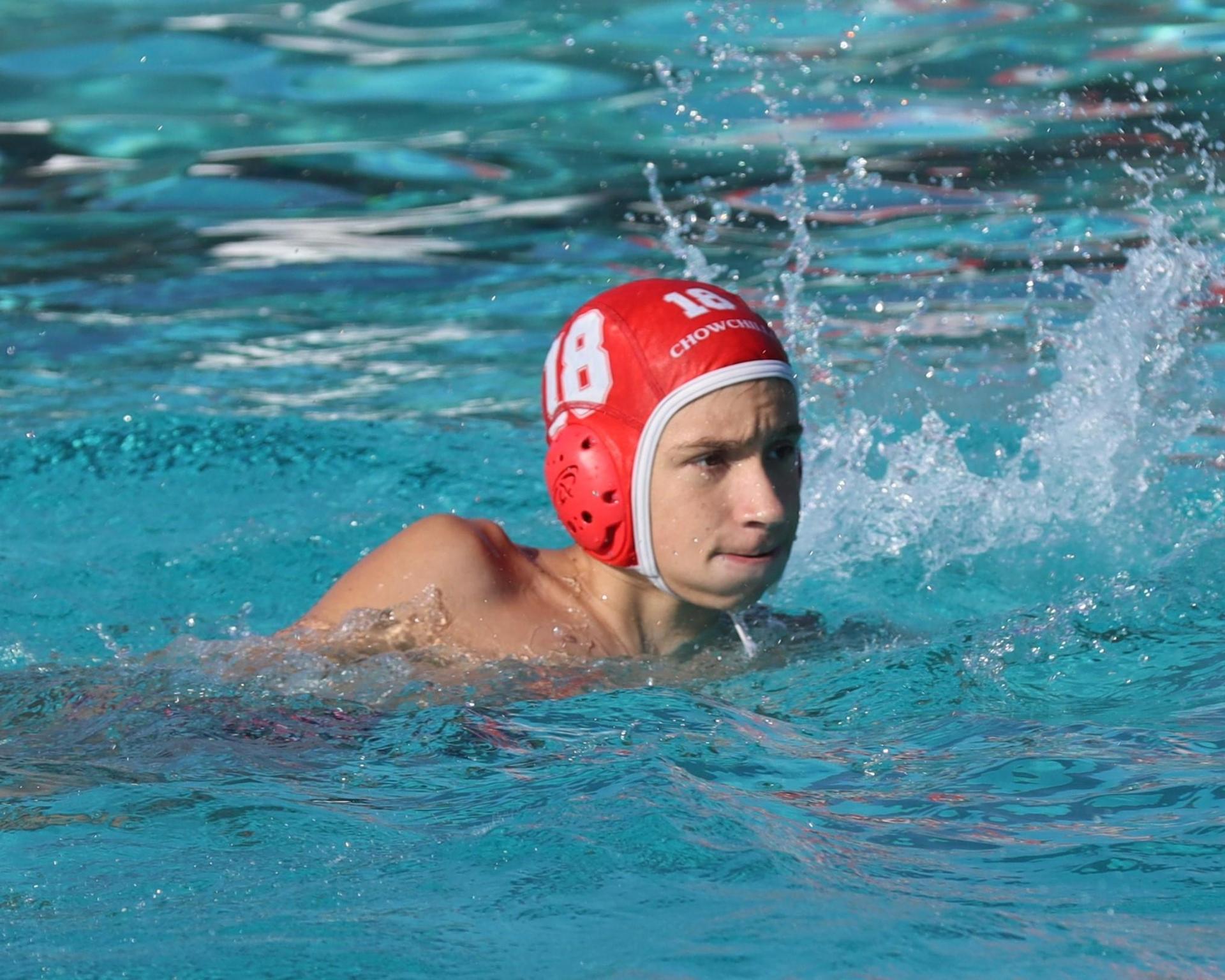 Boys playing water polo against Yosemite