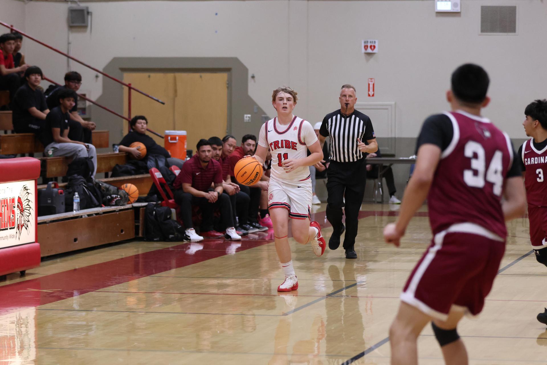 Varsity Boys Basketball playing vs. Orosi 60