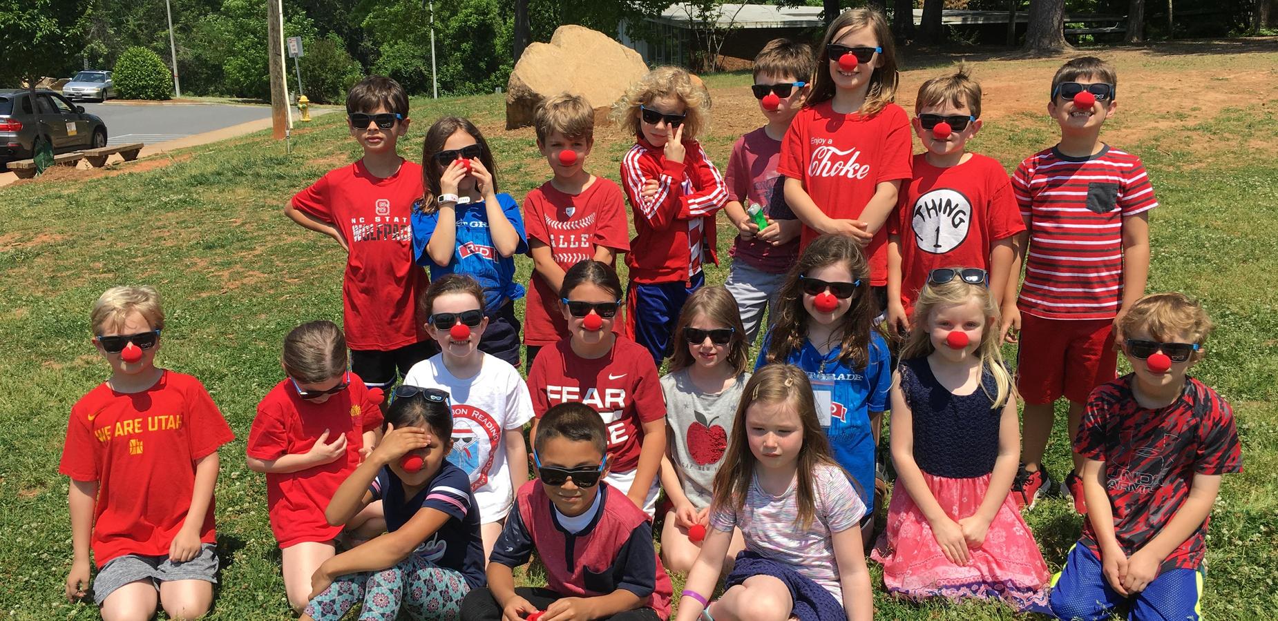 Students wearing red noses for Red and Blue Day
