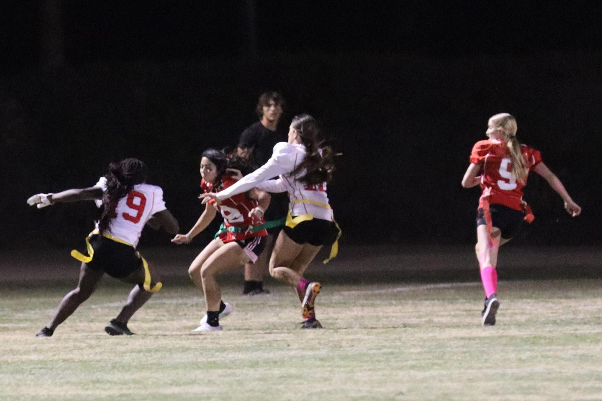 girls playing flag football