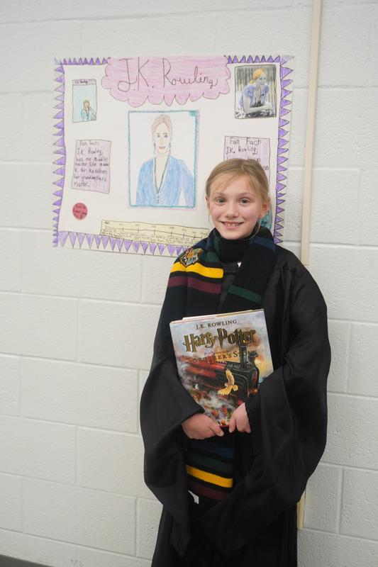 A student portrays J.K. Rowling at the wax museum.