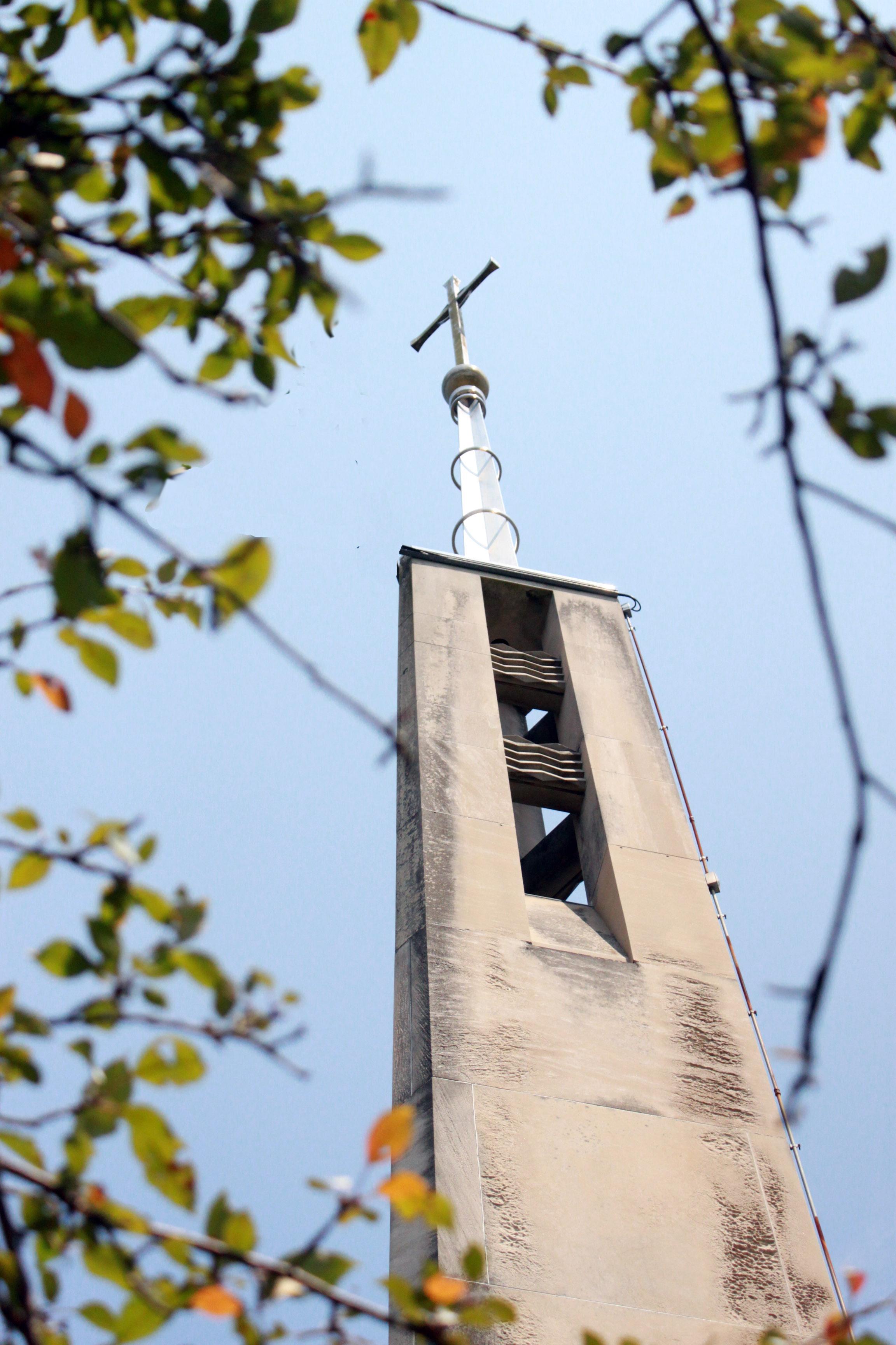 Spire and clouds