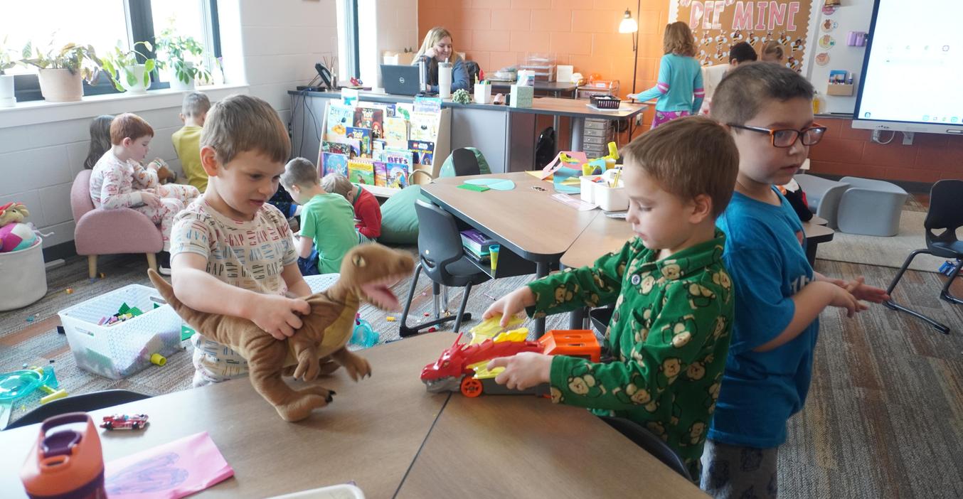 Students play with toys on Global School Play Day.
