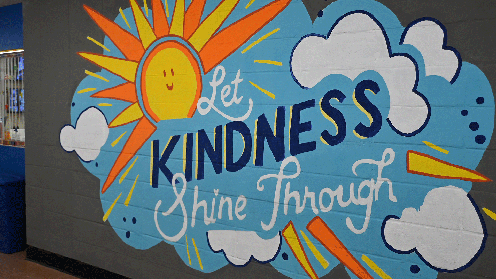 let kindness shine through wall mural