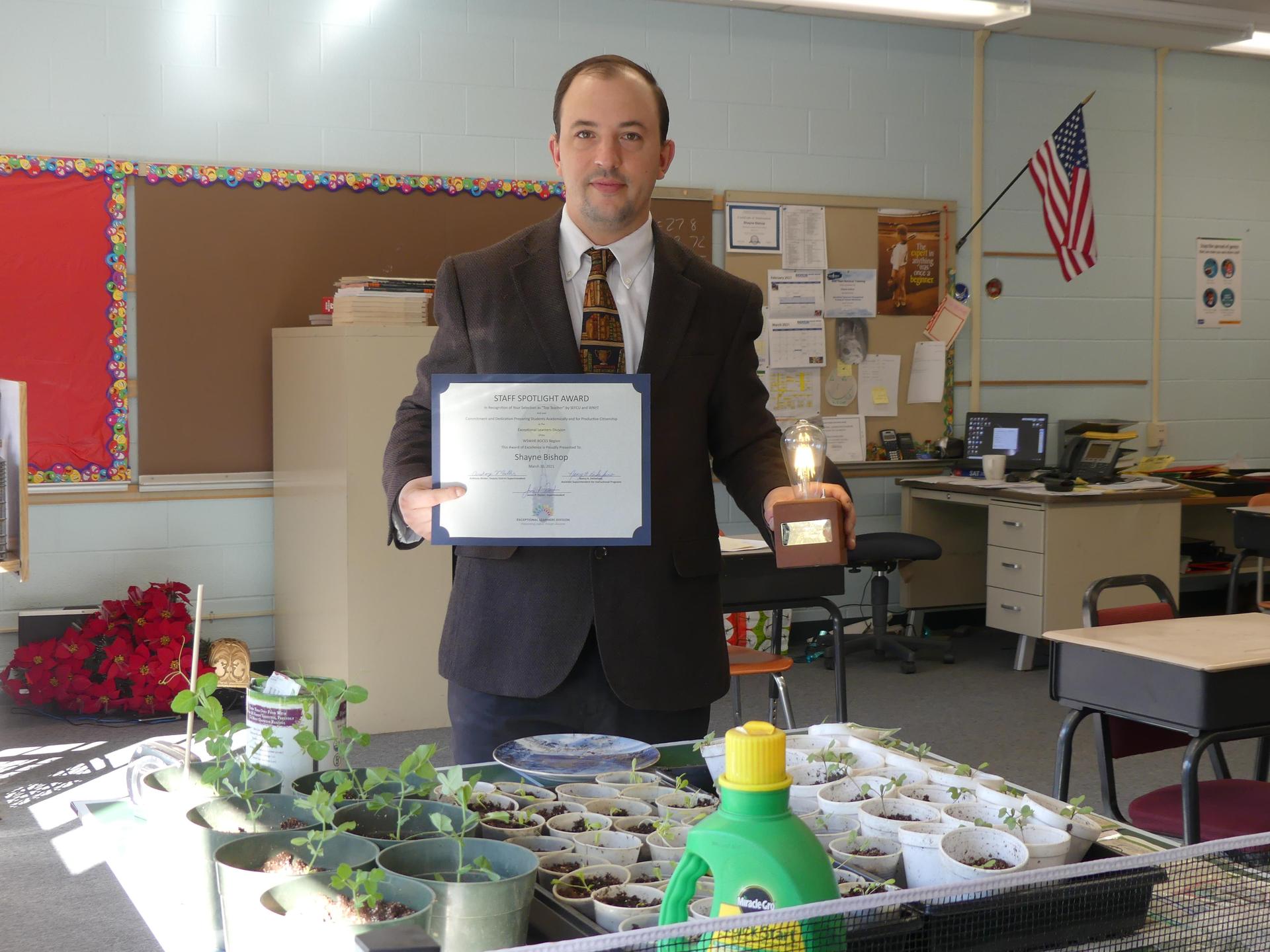 shayne bishop with spotlight award