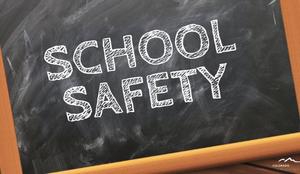 A chalkboard with the words "School Safety" on it
