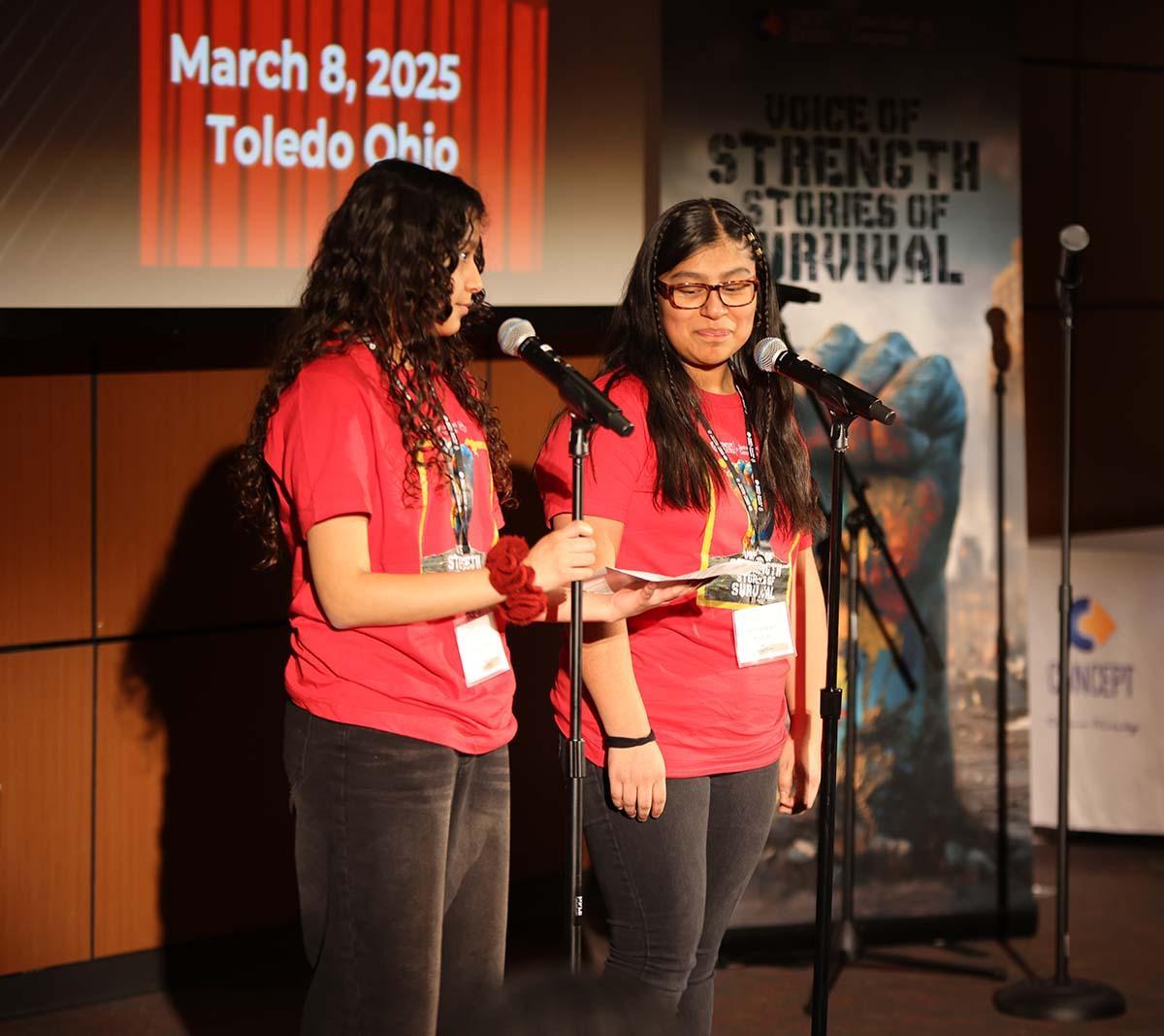 Two students presenting at A Concept Schools student presenting at Concept School's Spoken Word Event