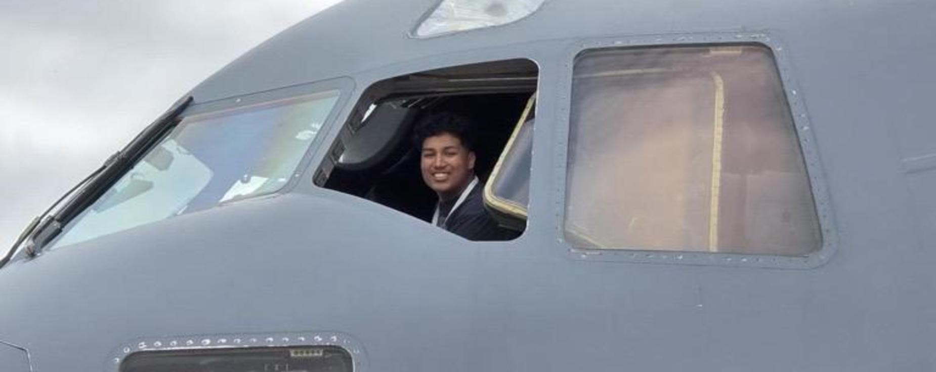 Air Force Leadership Academy - 2026 - Student in the cock pit of a plane