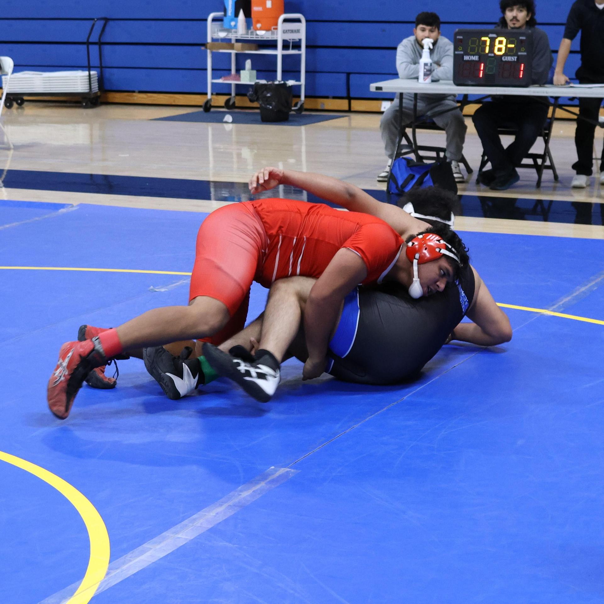 wrestlers in action at parlier