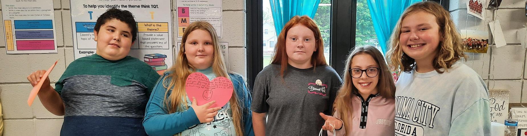 Five 5th grade students having a great day.