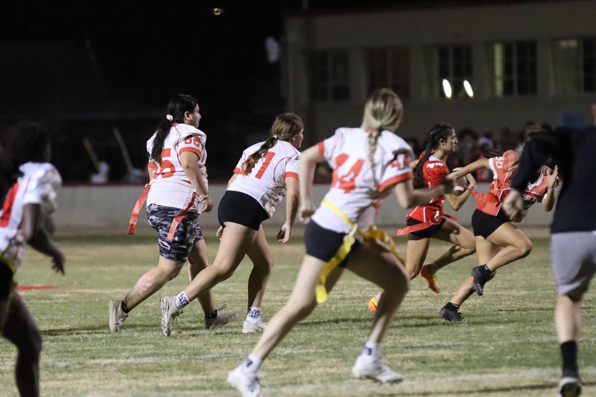girls playing flag football