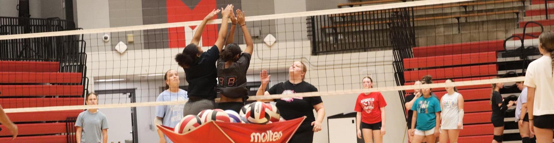 "The Mayfield High School volleyball team is hitting the court hard as they prepare for the upcoming season. Through rigorous drills and team-building exercises, they’re refining their skills and strengthening their bond, aiming to bring their best game to every match."