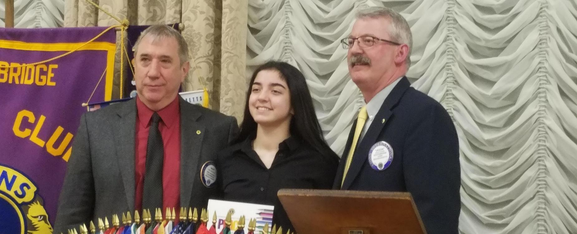 A student wins a poster contest award from the Southbridge Lions Club