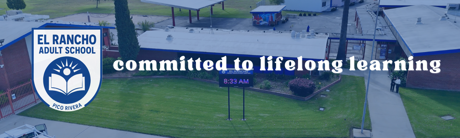 El Rancho Adult School campus with logo and message “Committed to lifelong learning”