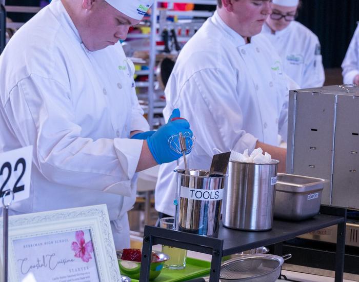 Students participating in cooking competition