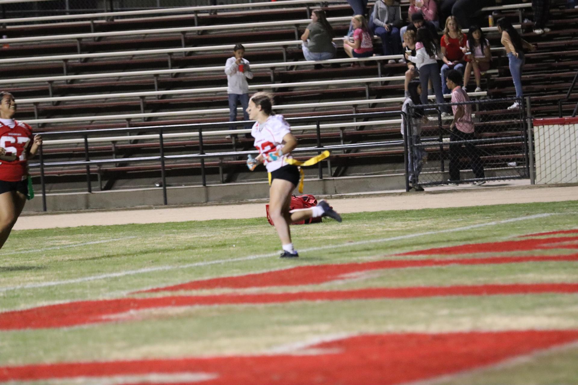 girls playing flag football