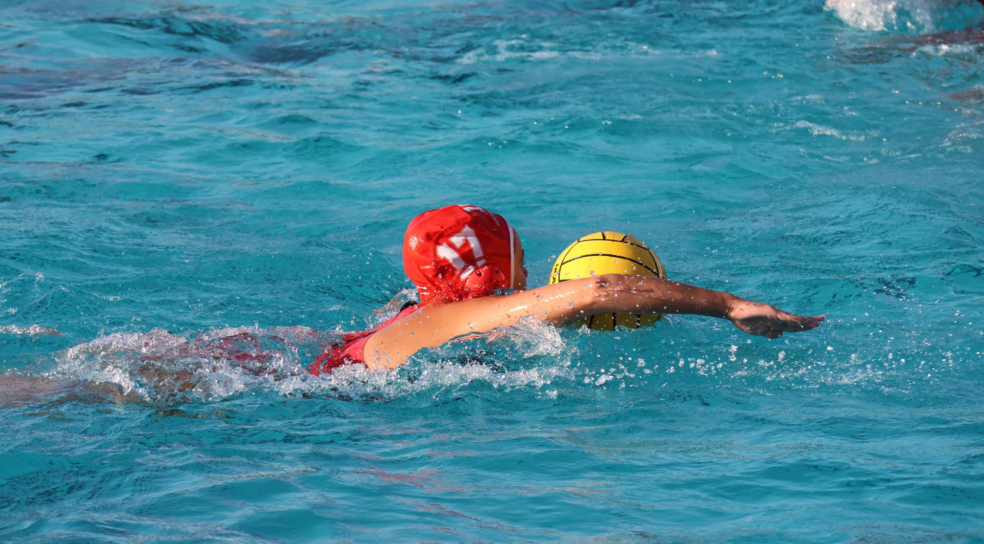 girls playing water polo against Sanger West