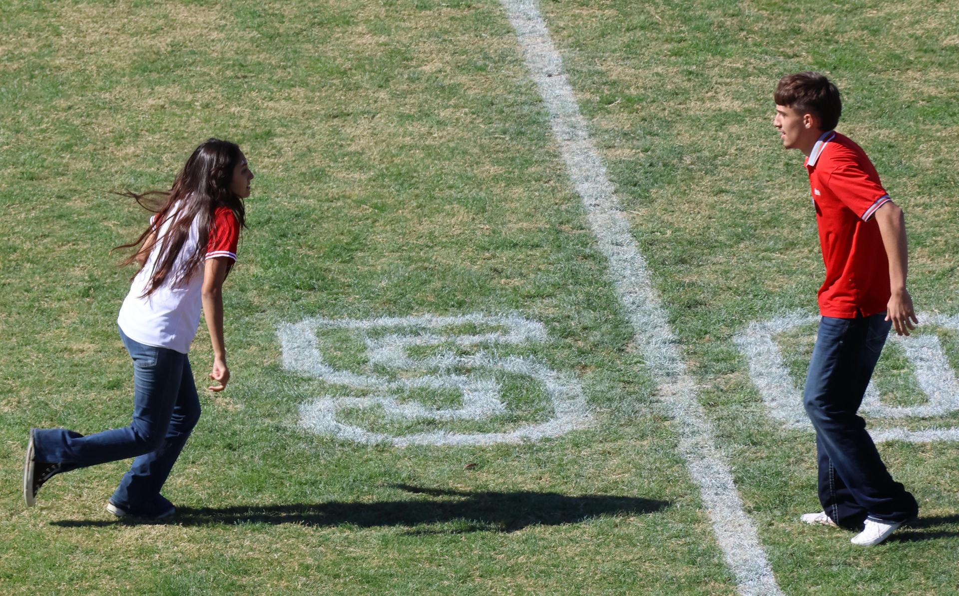 students and staff at the homecoming rally
