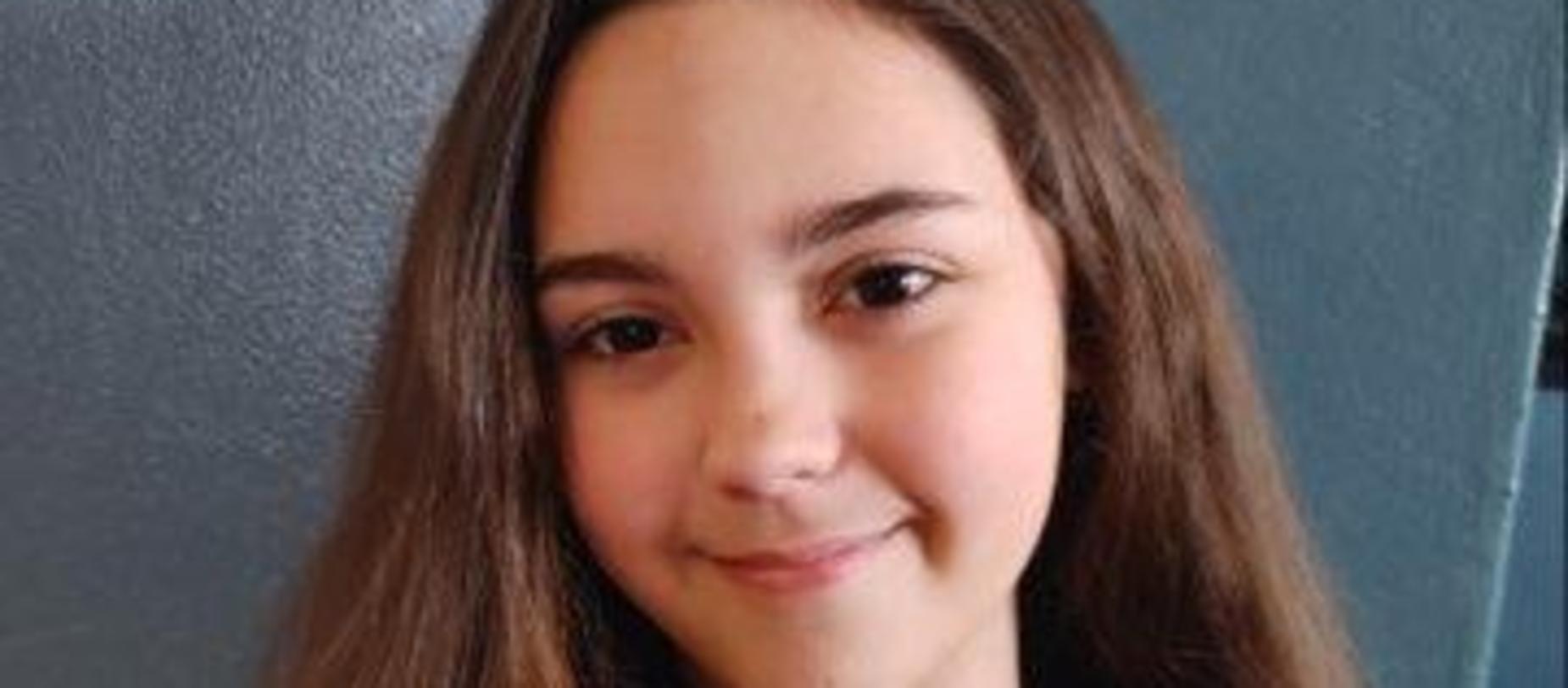 girl smiling for the camera