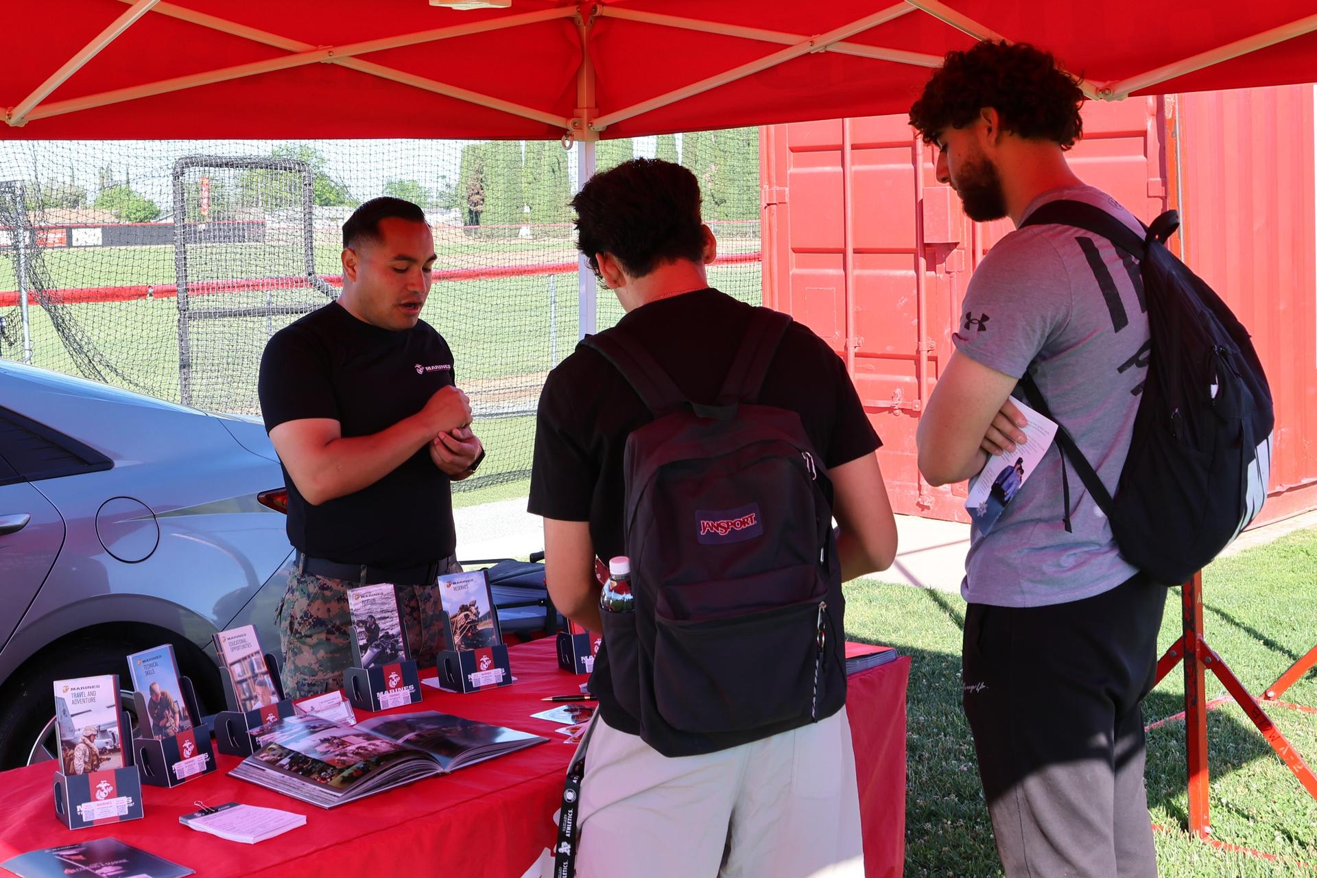 Marine recruiter talking to students