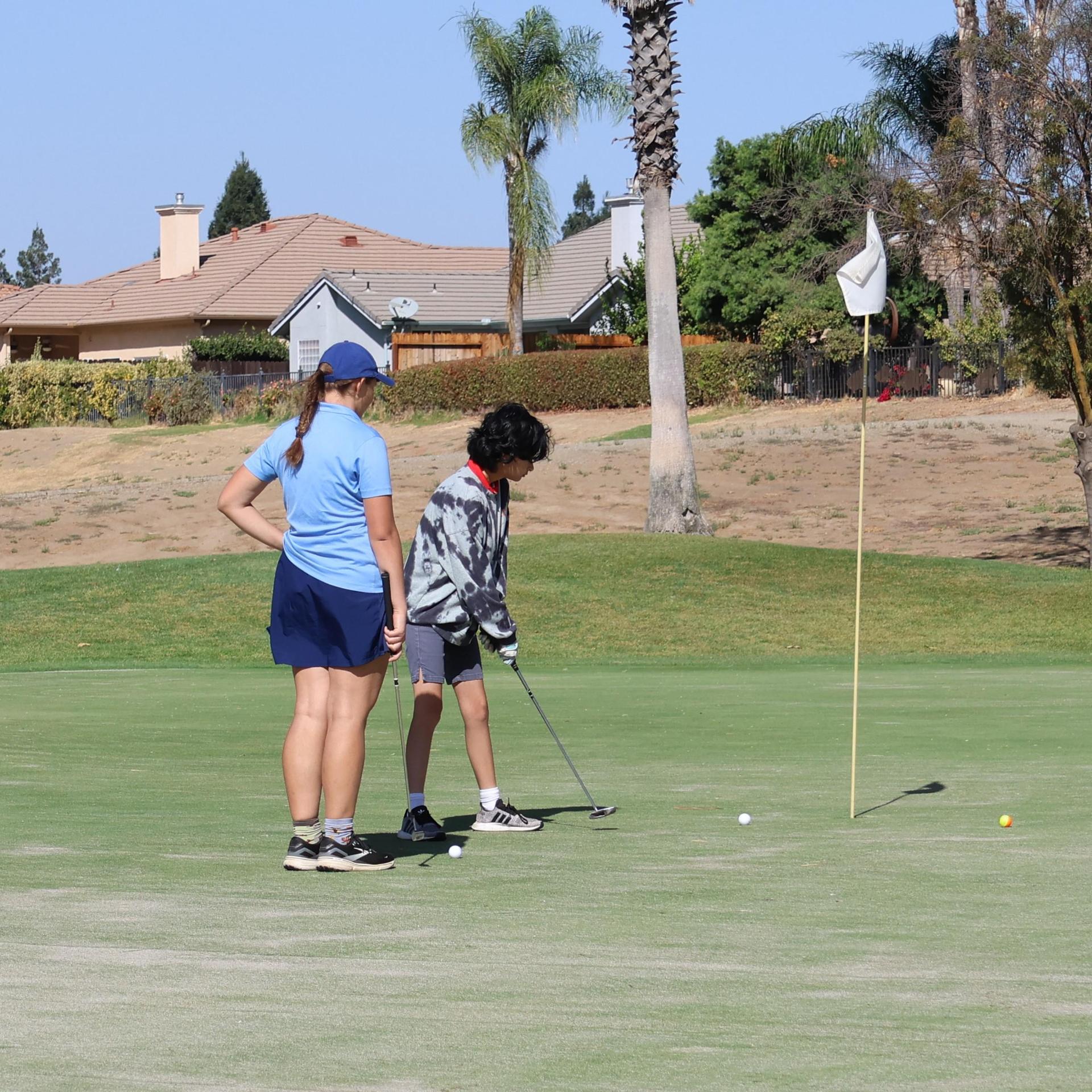 Girls golfers in action at the championships