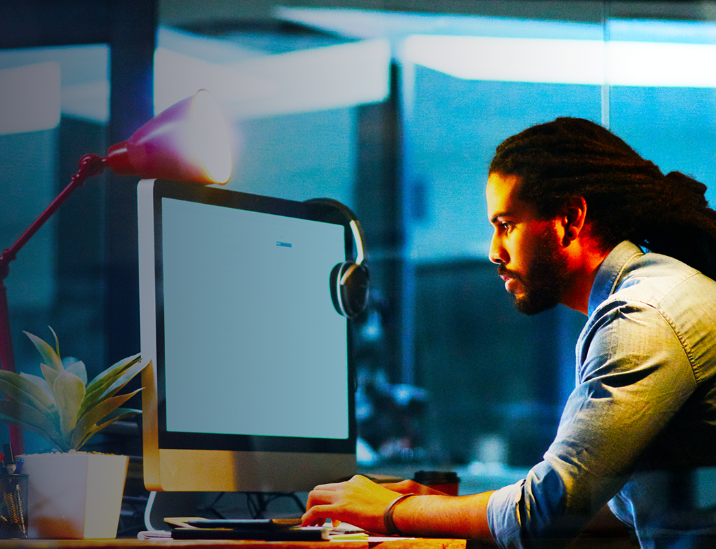 person typing on a computer