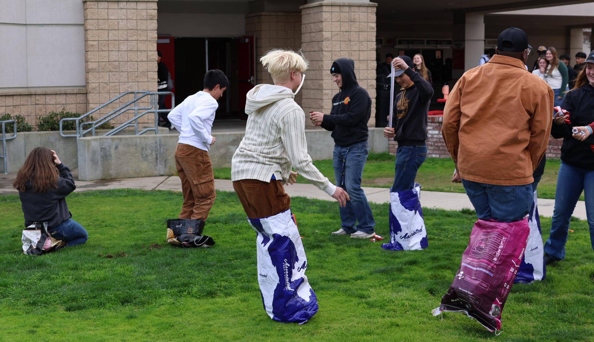 students and staff enjoying the feed bag relay