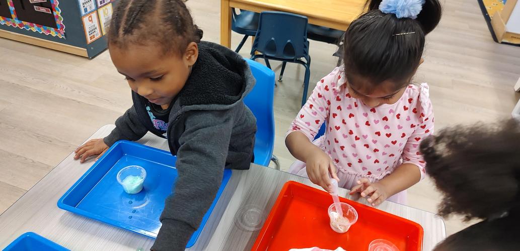 Making fizzy, funny volcanoes.