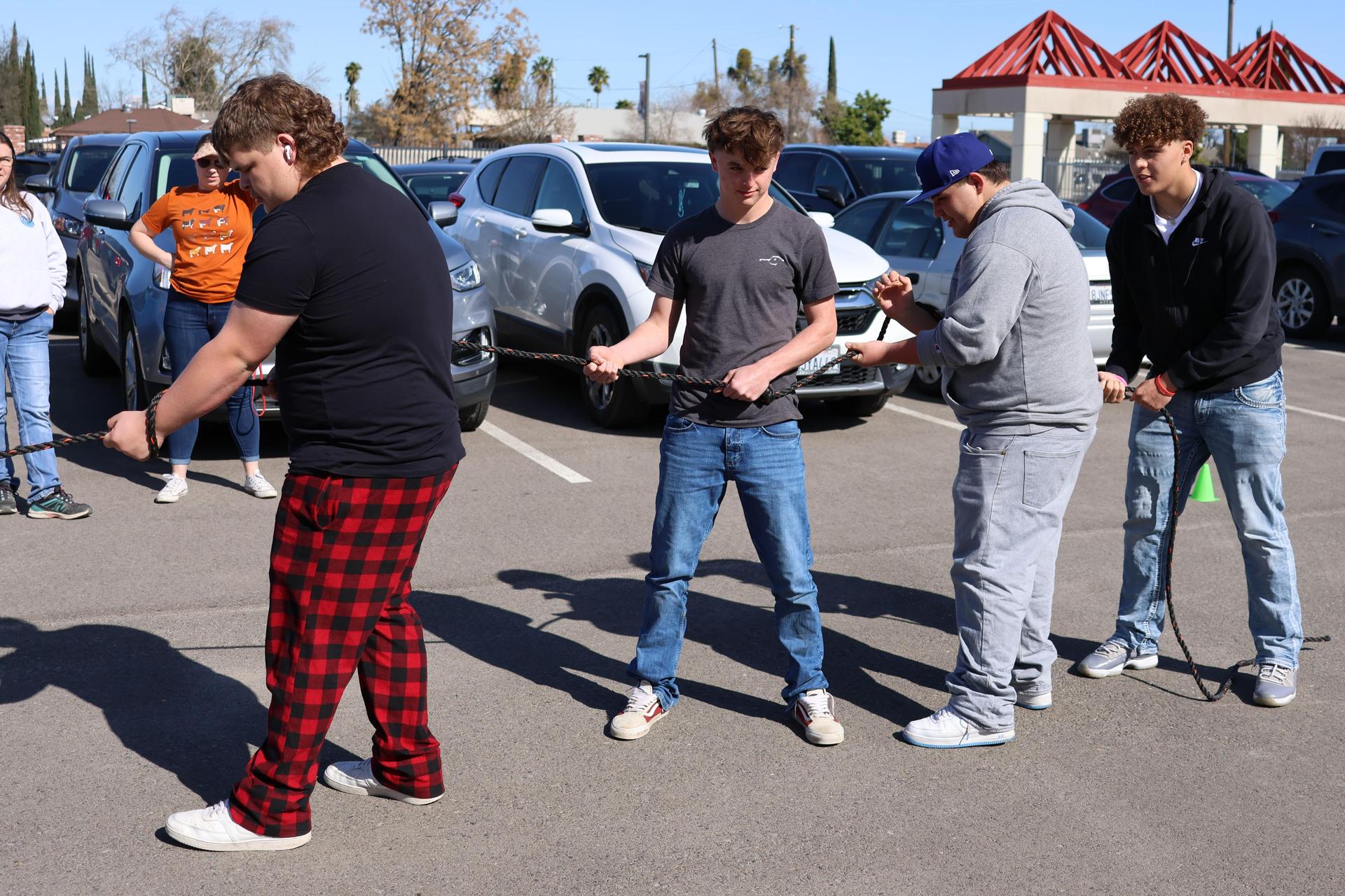 students and staff enjoying the truck pull