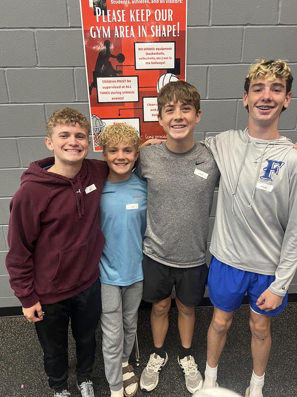 Four male students grouped together at Middle School UIL Competition.