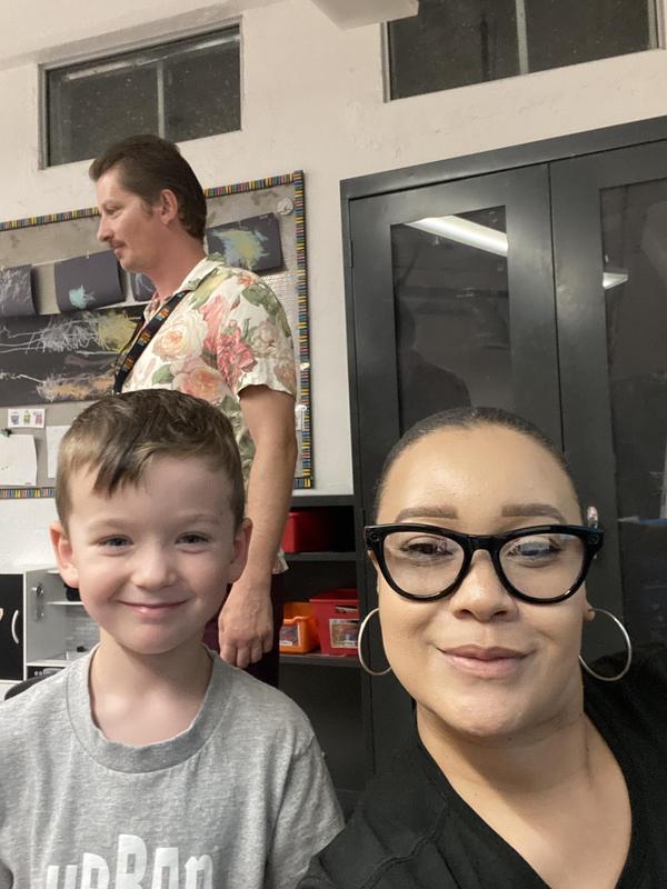 Ms. Nikia with student.