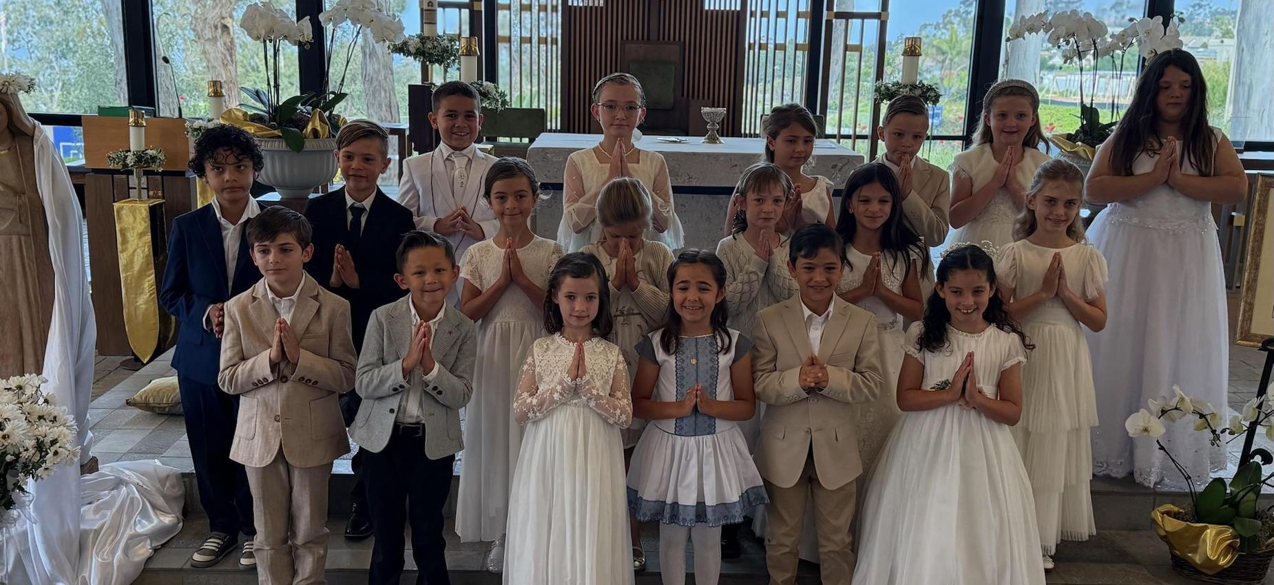 2nd grade posing in front of Altar for May Crowning Mass